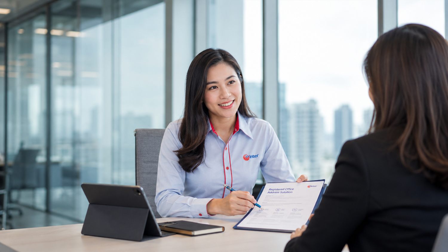 An IGS Consulting adviser talking a client through the registered office address service